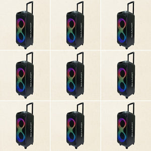 Grid of Sharp PS-935 party speakers with trolley wheels, handles, and colorful LED light rings.