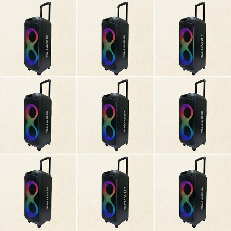 Grid of Sharp PS-935 party speakers with trolley wheels, handles, and colorful LED light rings.
